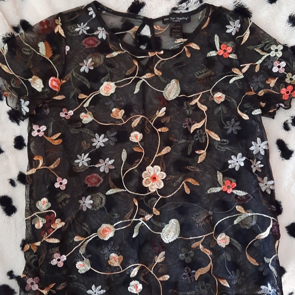 See you Monday black sheer top.
